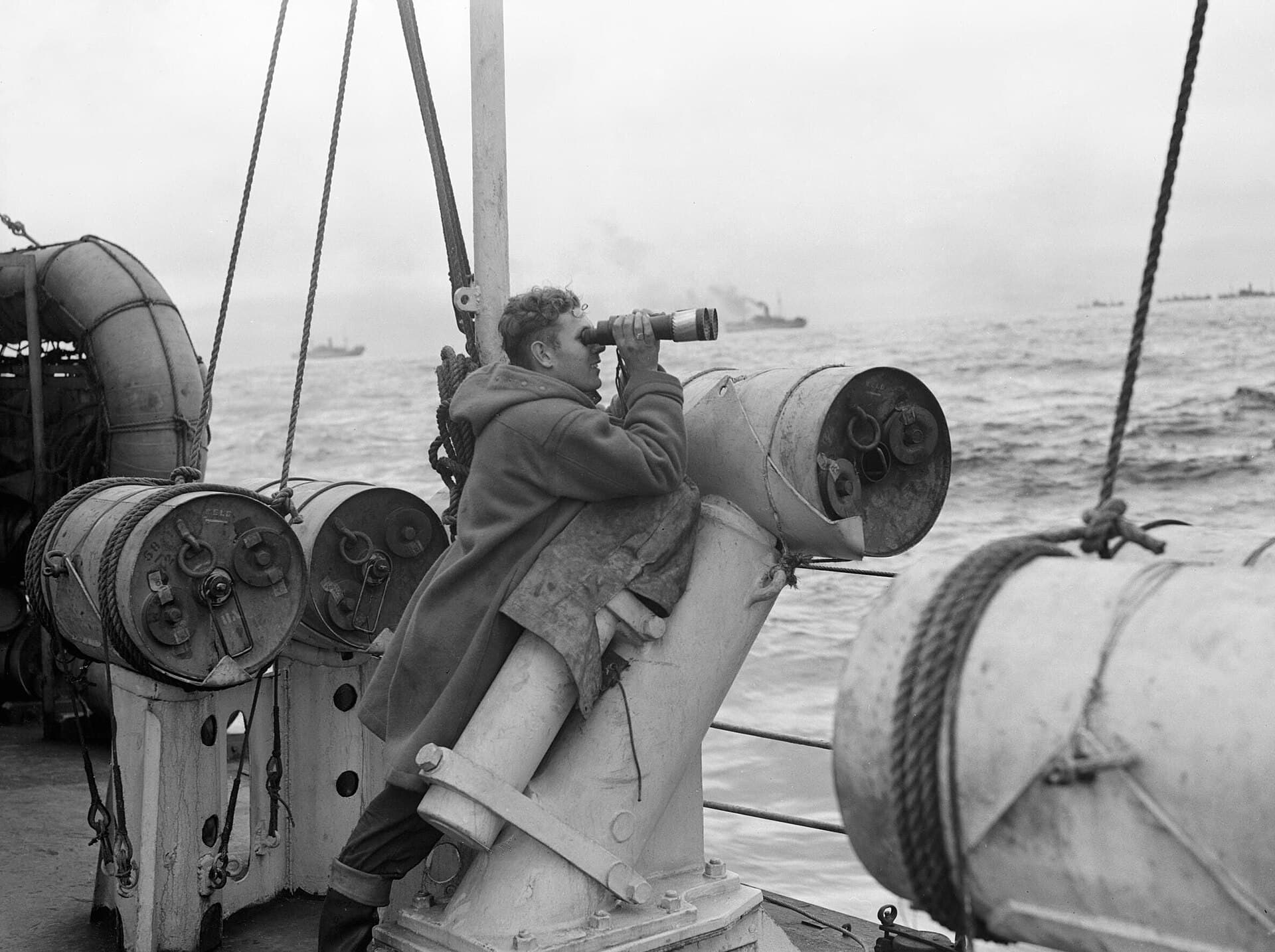 The quarterdeck lookout on board HMS Viscount searching the sea for submarines, 1942